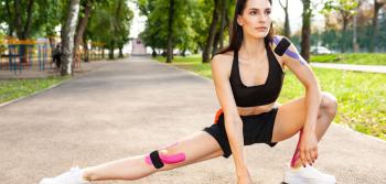 Woman stretching at the park