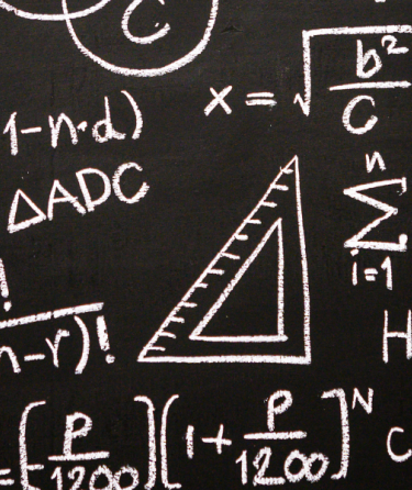 Mathematics equations written on a blackboard