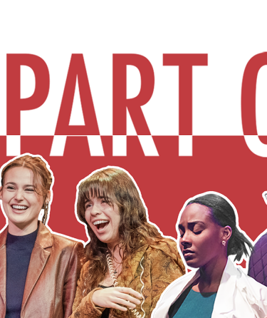 Group of performers in colorful costumes with the phrase 'Be a Part of It!' displayed above them.