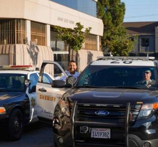 Officers and Deputies in patrol vehicle