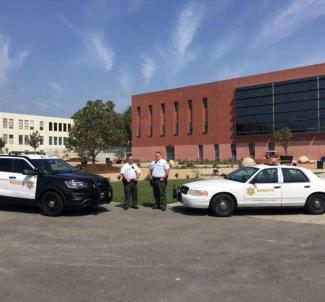 Officers in front of the North Quad Park