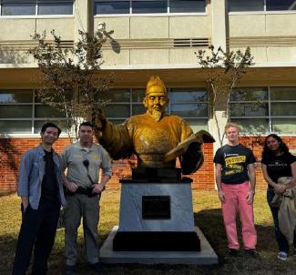 Deputy Pastrano with students at the new statue commemorating Korean King Sejong, creator of Hangul, the Korean alphabet.