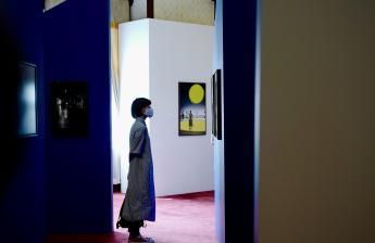 Woman standing in art gallery 