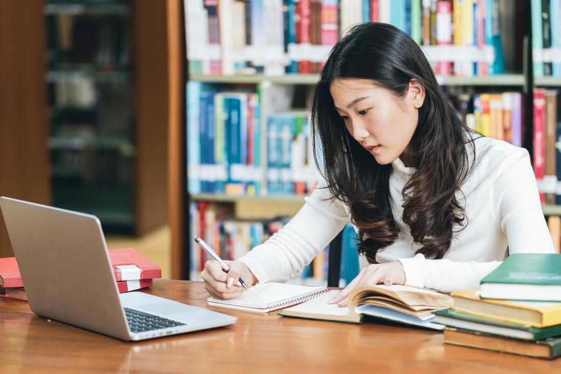 Women studying in library