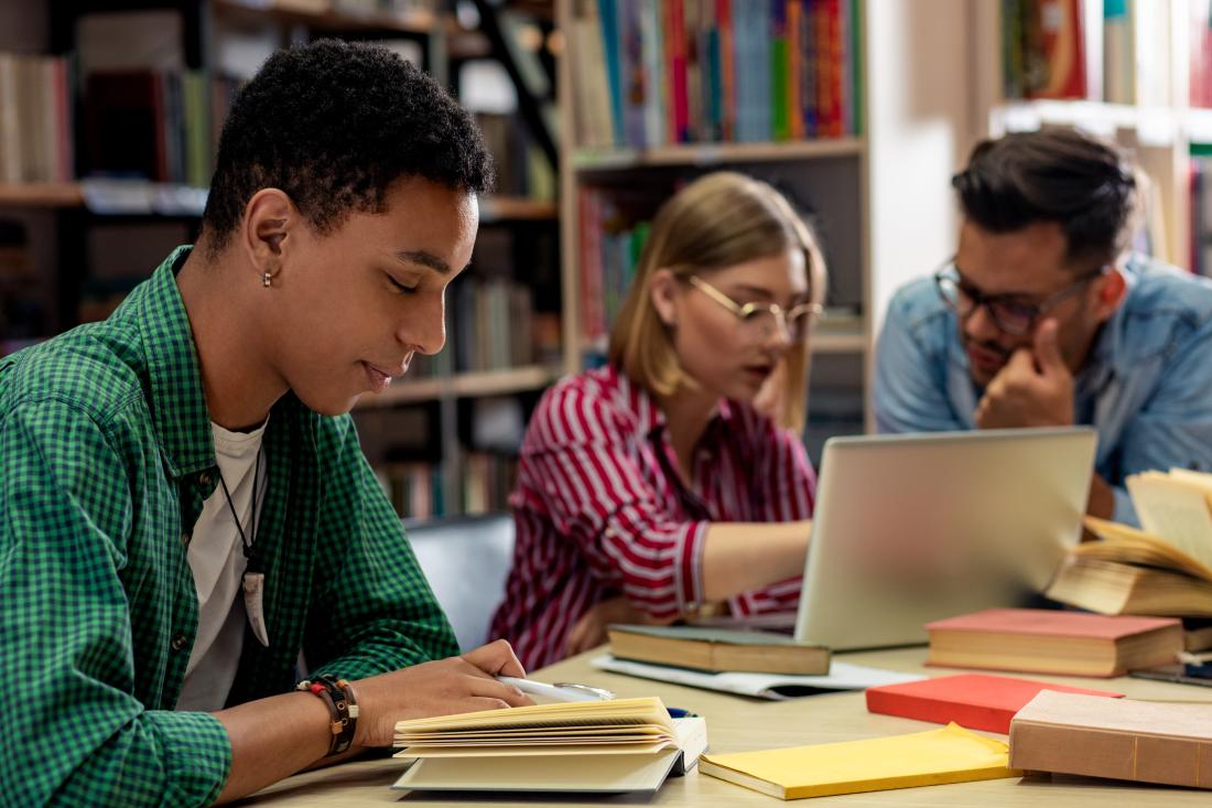 Three students studying together