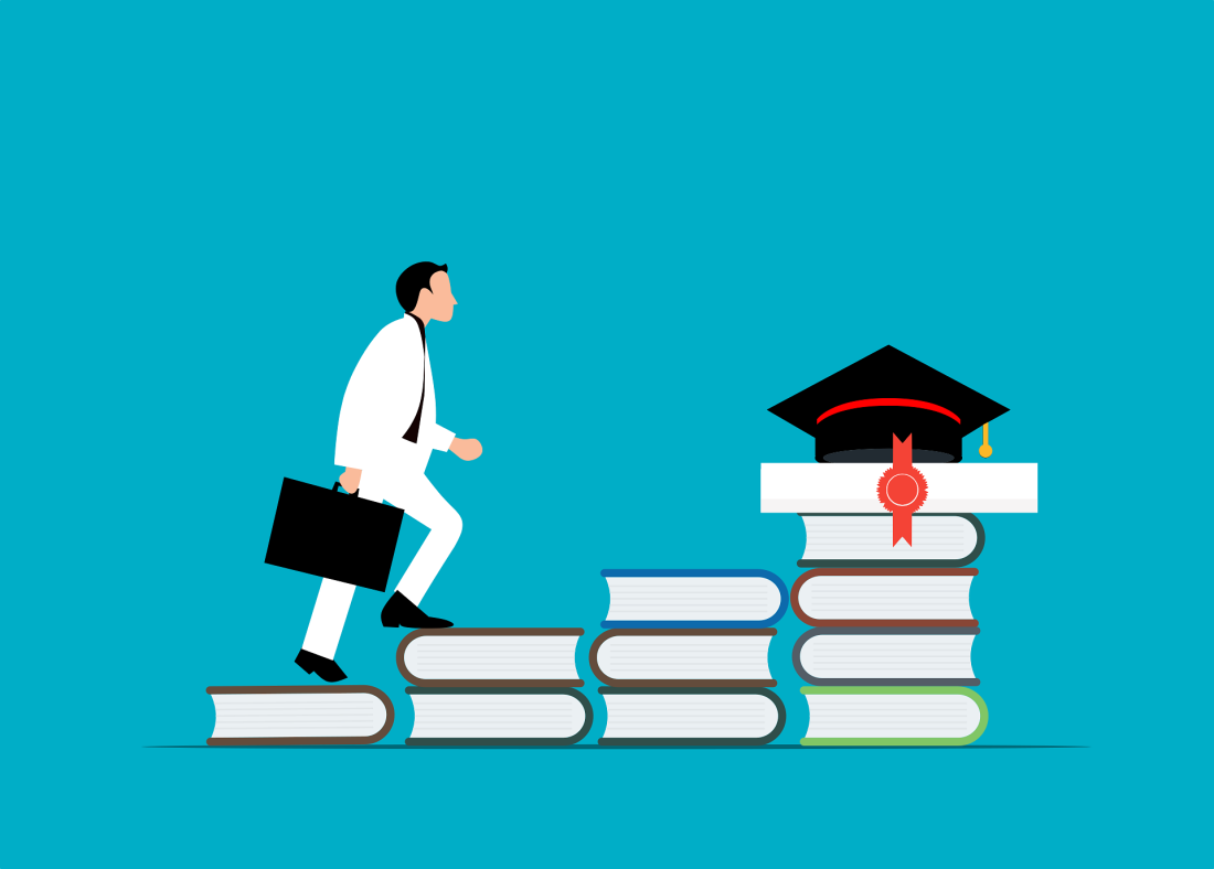 Man walking up staircase made of books to reach a diploma