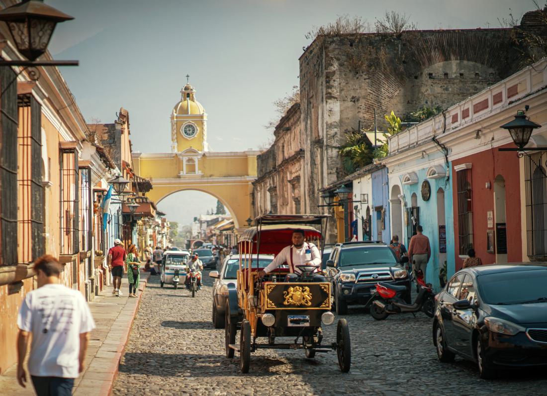 Antigua Guatemala Scenery with people walking in its streets.
