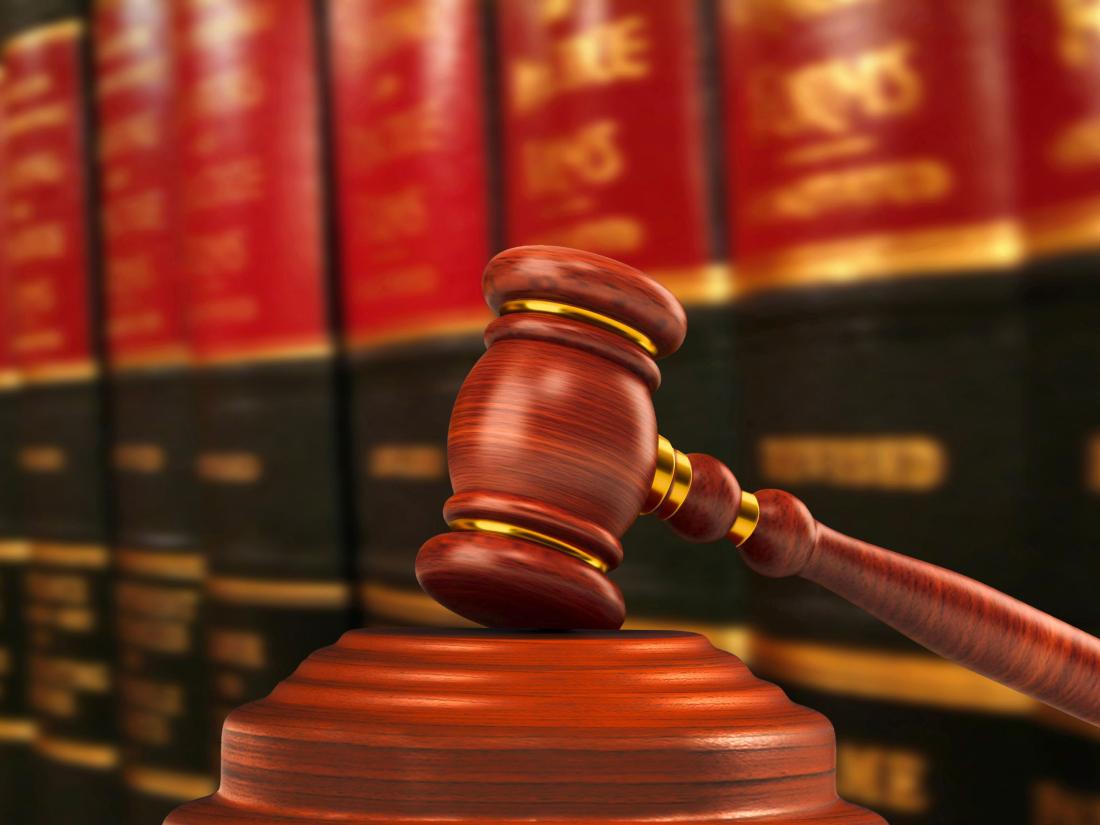 Wood hammer with law books