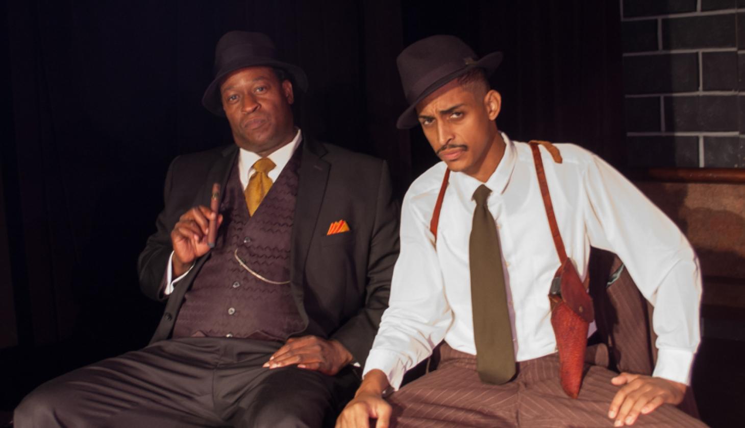 Two Gentlemen Sitting Observing