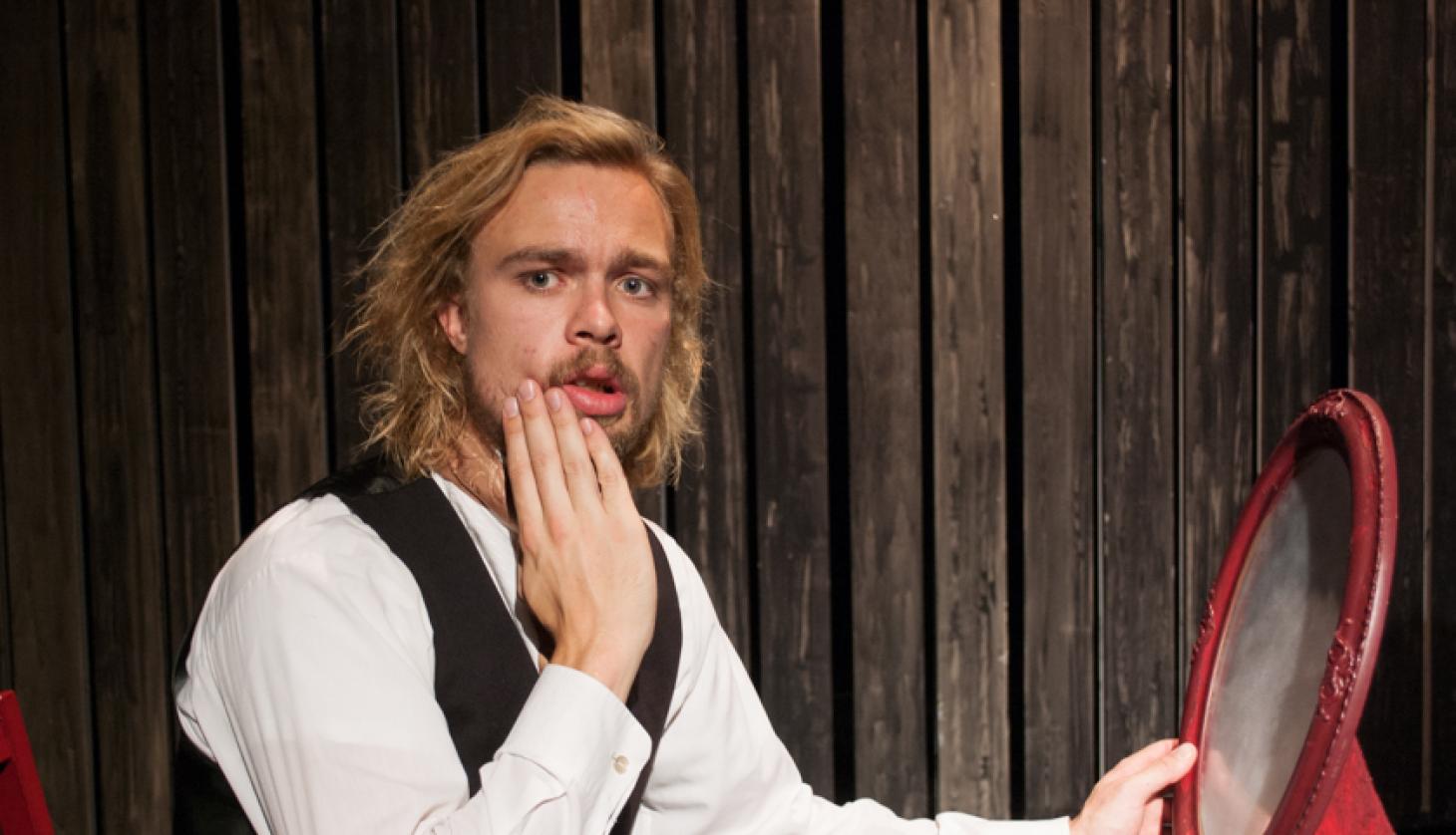 Actor Looking in Mirror
