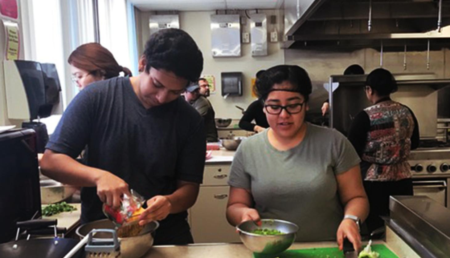 Young People Cutting Vegetables