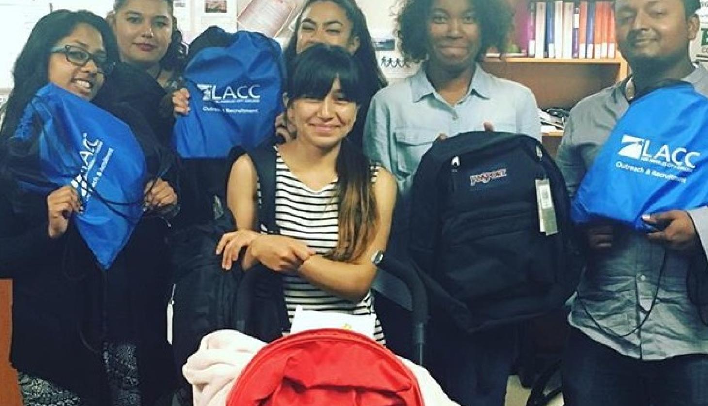 Group of Students Showing LACC Material