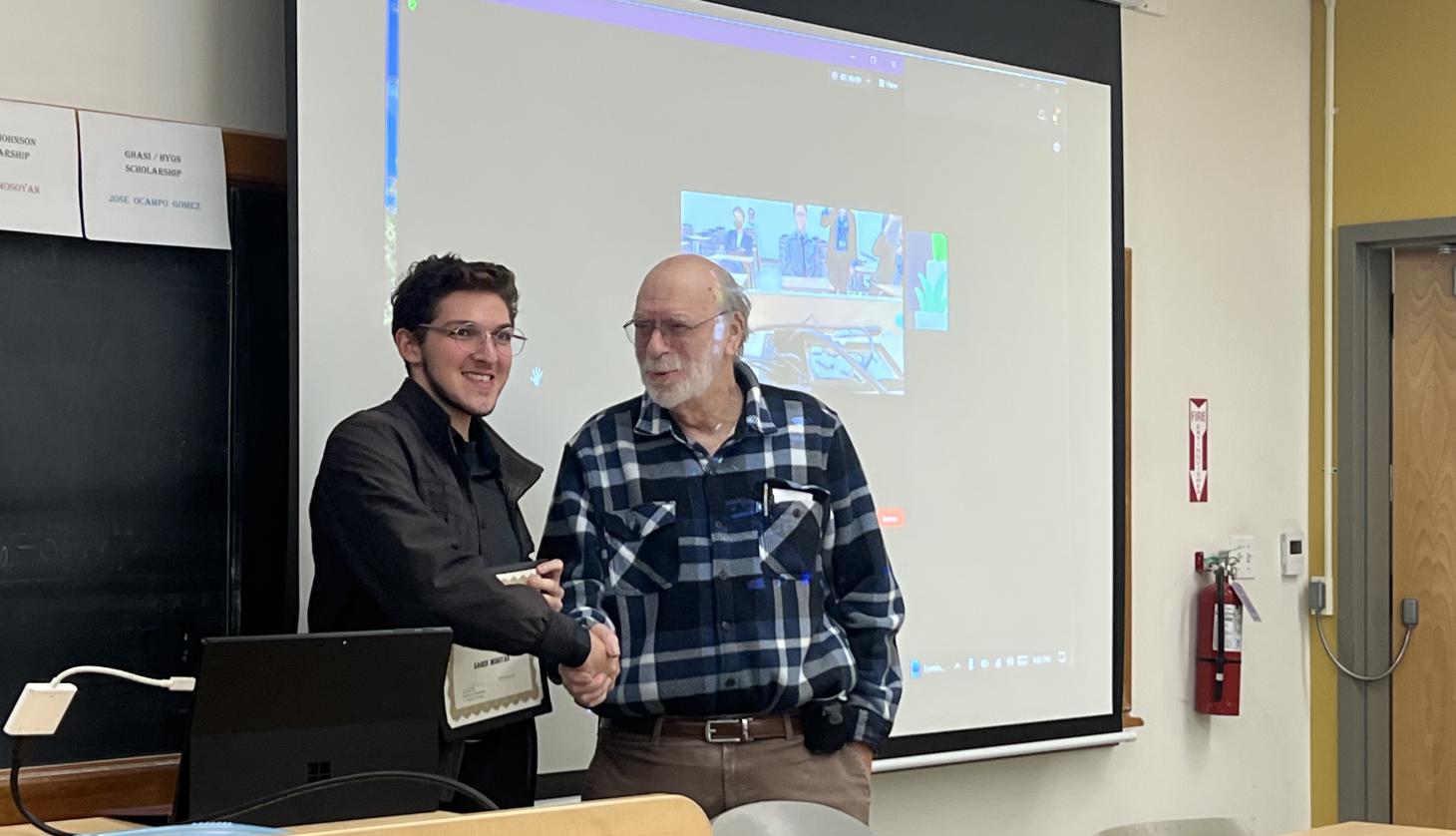 Image of Professor Ron Kendis and math scholarship recipient.